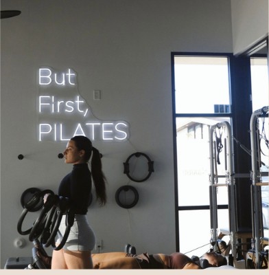 Instructor by the barre